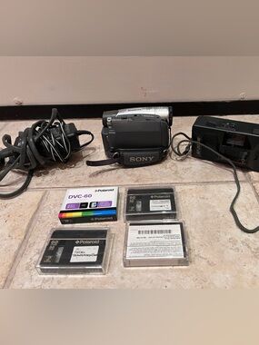 Sony Handycam Camcorder for parts Ricoh camera Polaroid blank tapes new and used
